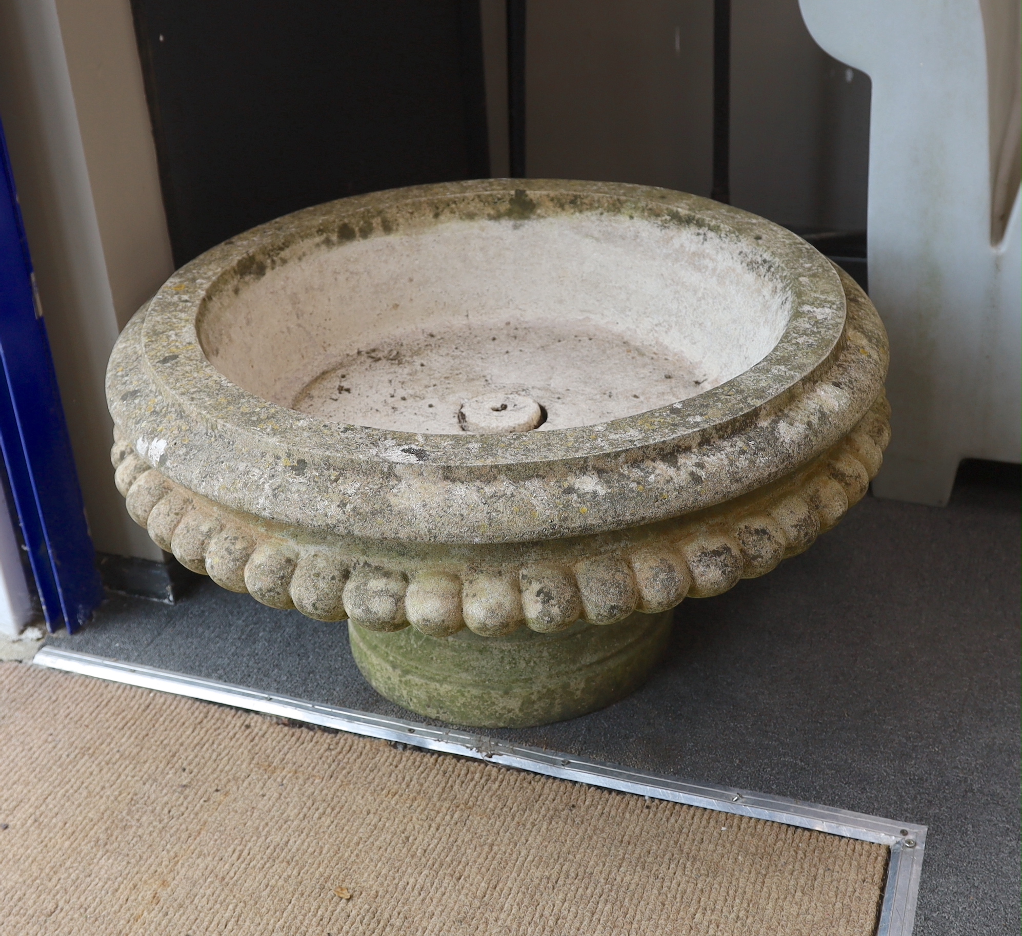 A pair of circular reconstituted stone garden planters, diameter 74cm, height 42cm